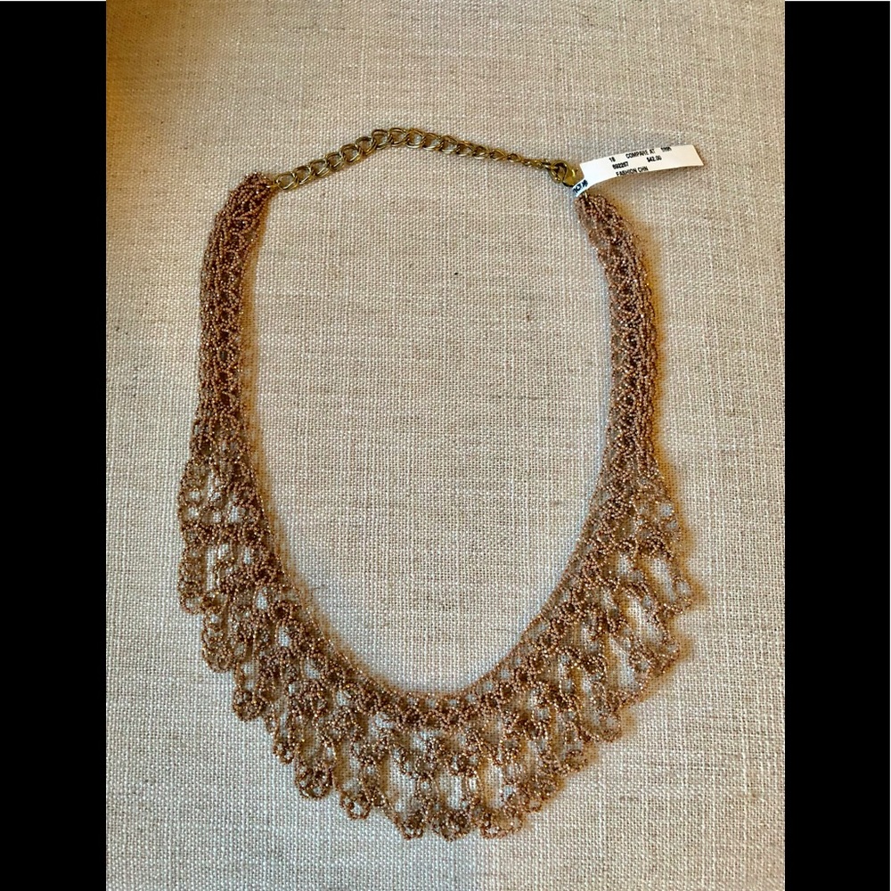 Unique fashion necklace in a mauve taupe color